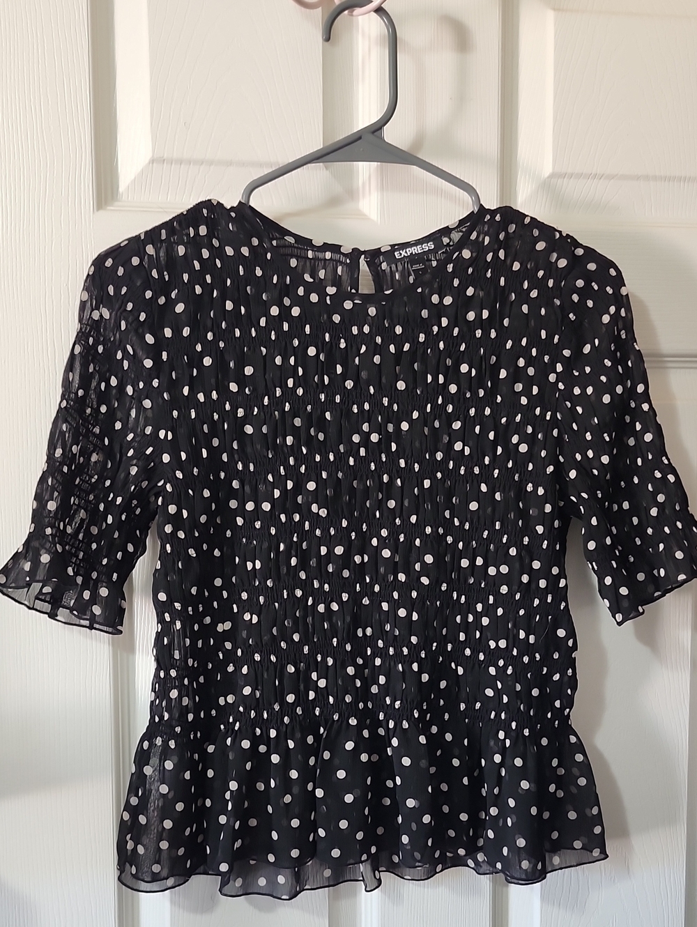 Express Black and White Polka Dot Smocked Peplum Blouse
